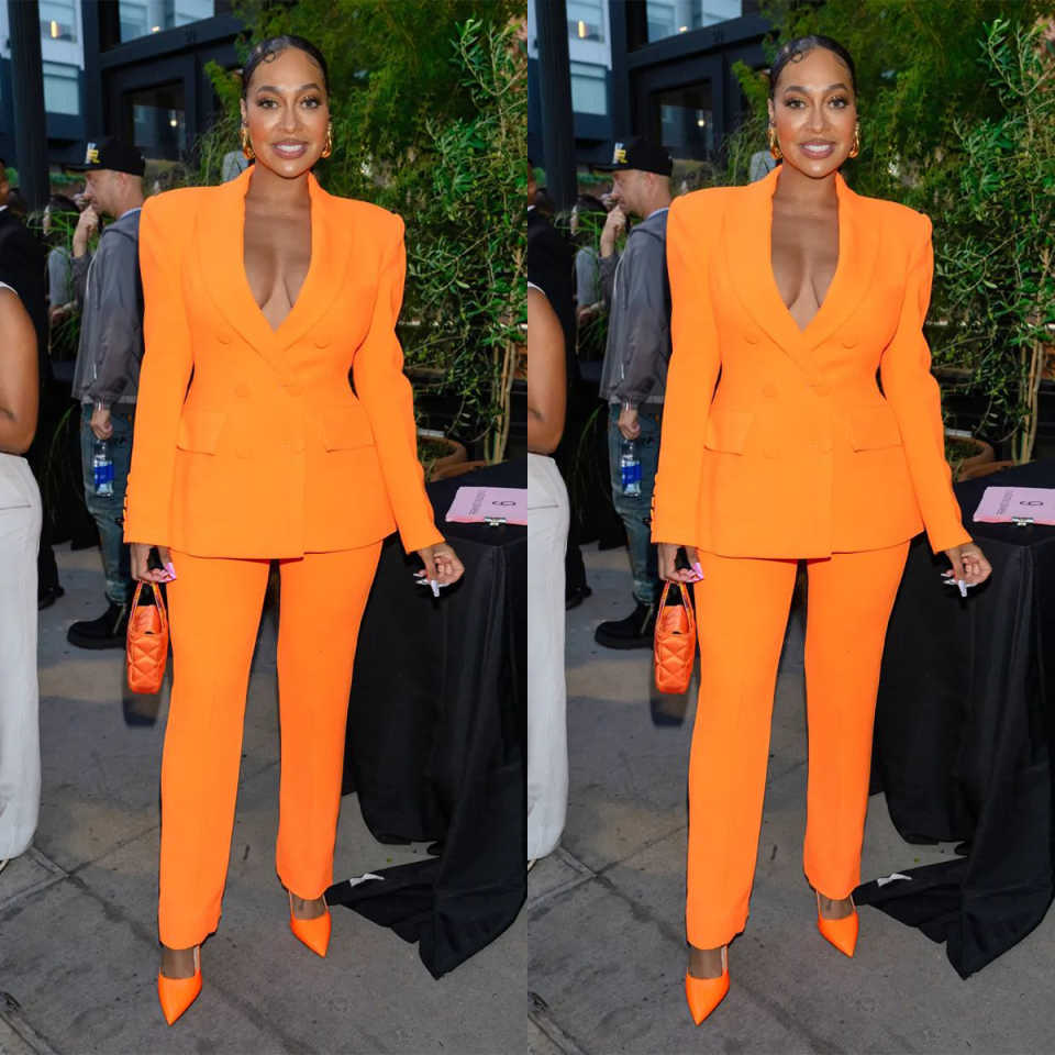 Conjunto de Calças Laranja Per - Women Formal Wear Designers avaliação e preço